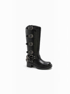 BROCK Stephan Paris black biker boots with multiple distressed metal buckles, rounded toe, and block heel.