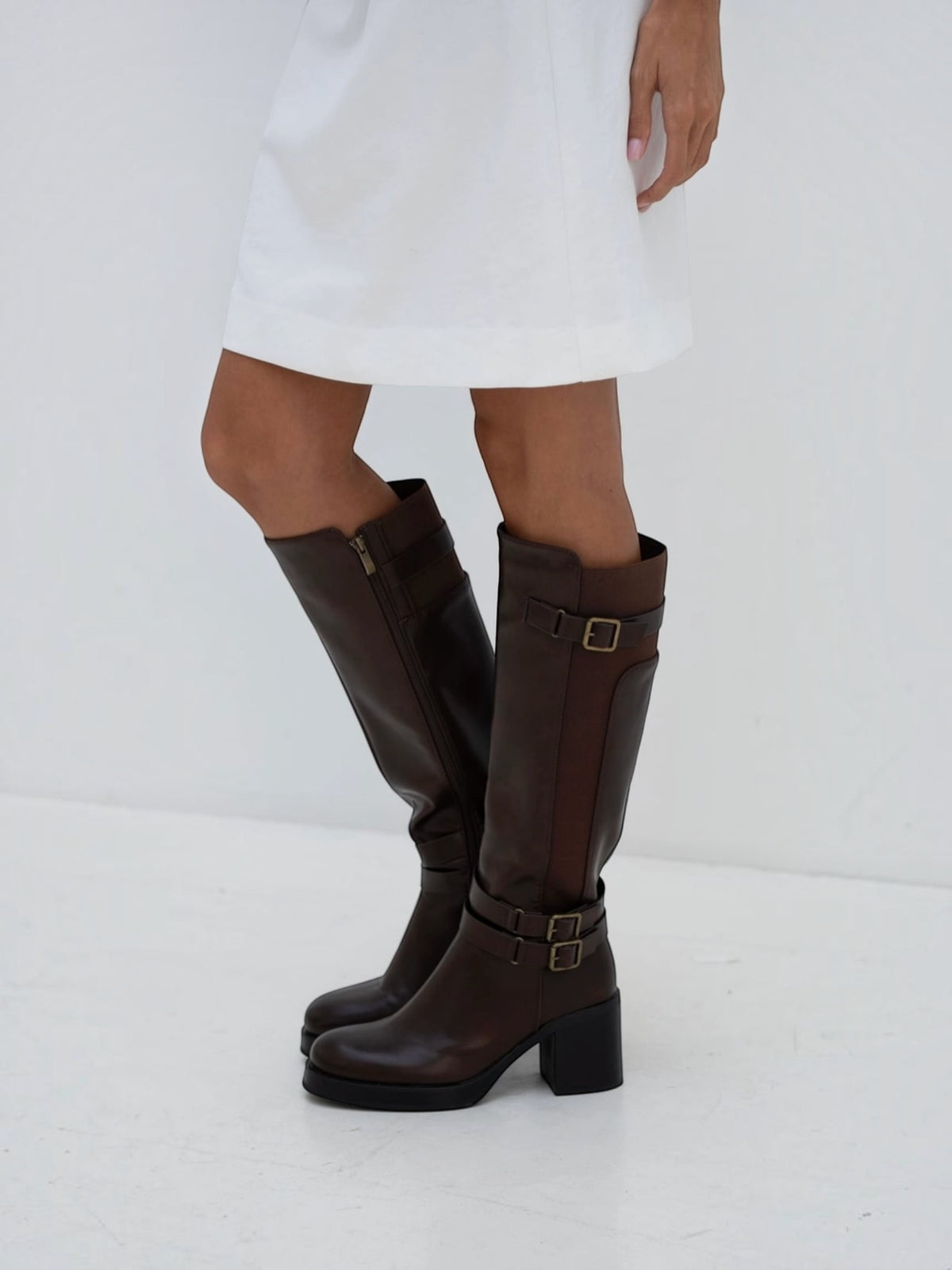 BROCK STEPHAN PARIS brown faux leather riding boots with three decorative gold buckles and side zip closure