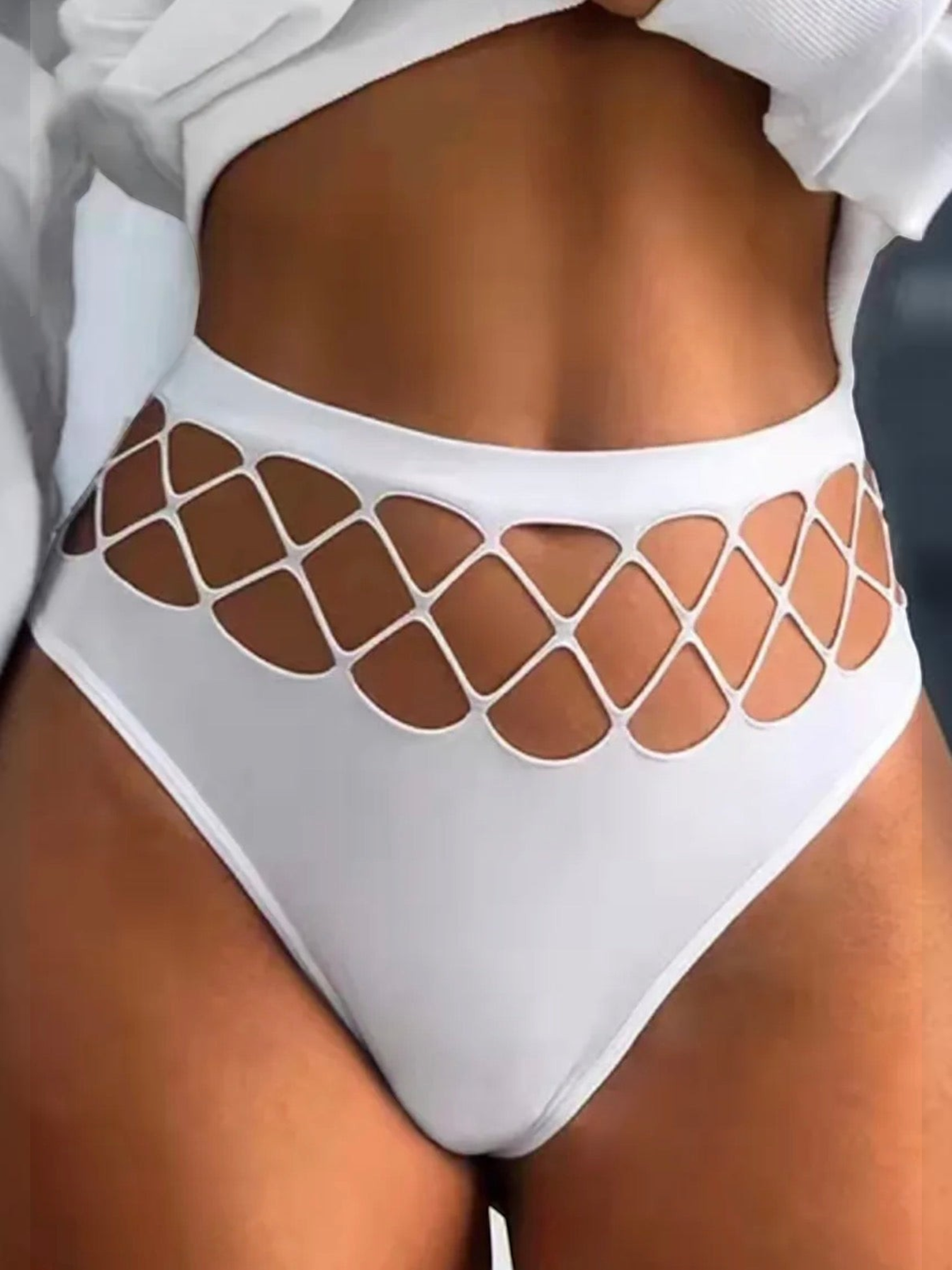 BROCK white mid-rise thong with intricate lattice cut-out detailing on the hips made from polyamide and elastane