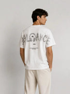 BROCK white cotton t-shirt with a large black typographic graphic print on the back, worn by a man