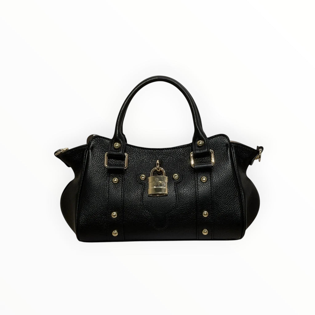 Sac à main noir LOUISA LEE en cuir grainé avec fermoir cadenas doré et clous dorés. Porté main ou épaule.