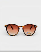 Lunettes de soleil ÉLINE L'ATELIER écaille de tortue avec verres dégradés marron polarisés.