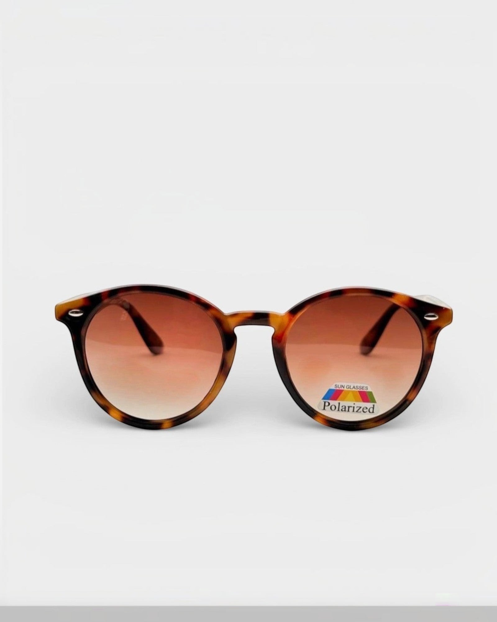 Lunettes de soleil ÉLINE L'ATELIER écaille de tortue avec verres dégradés marron polarisés.