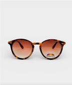 Lunettes de soleil ÉLINE L'ATELIER écaille de tortue avec verres dégradés marron polarisés.