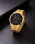 Montre chronographe  Gabriel dorée avec cadran noir et bracelet en acier inoxydable. Affichage date et sous-cadrans fonctionnels.