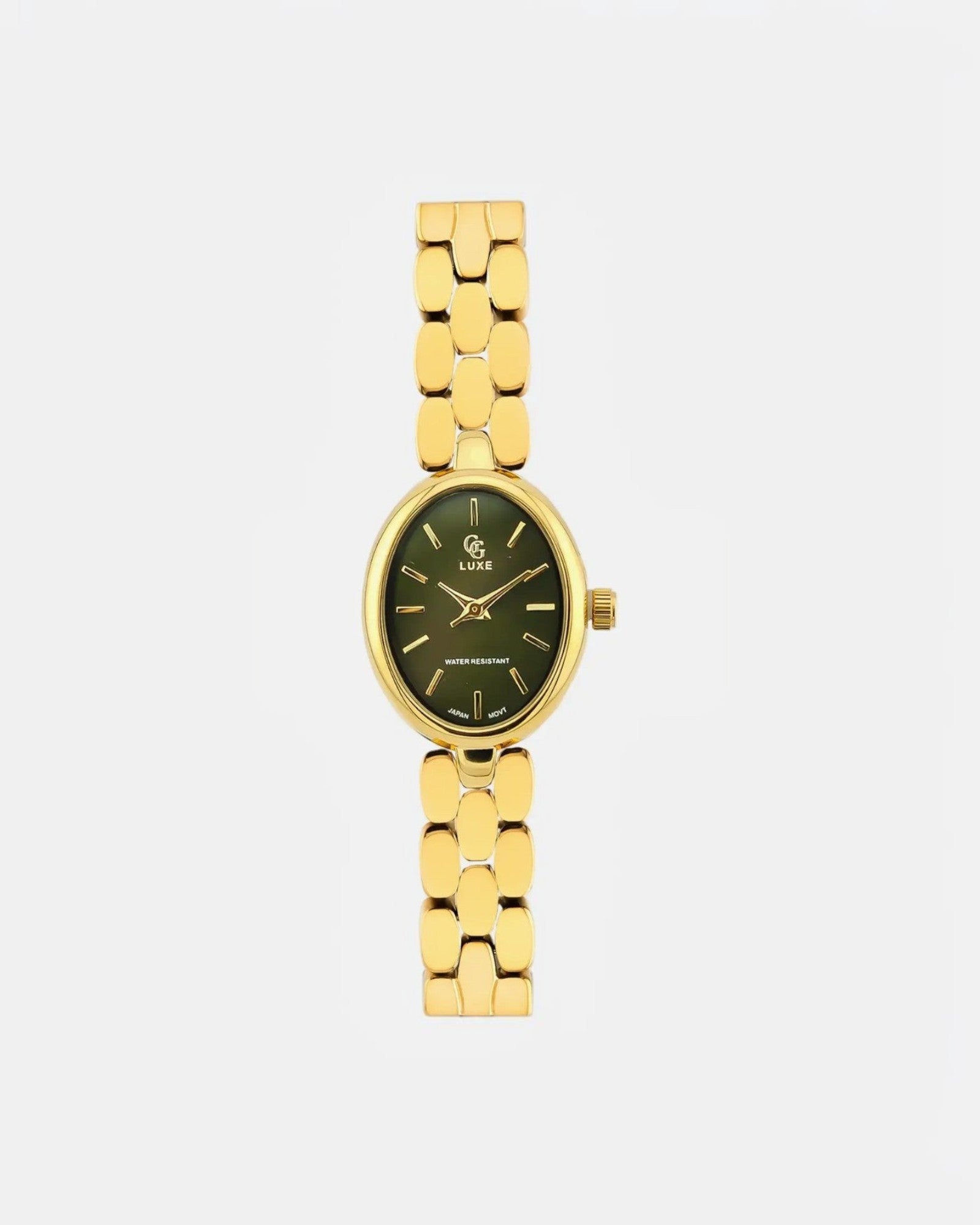 Montre Eve GG LUXE dorée, boîtier ovale, cadran vert, bracelet à maillons polis.