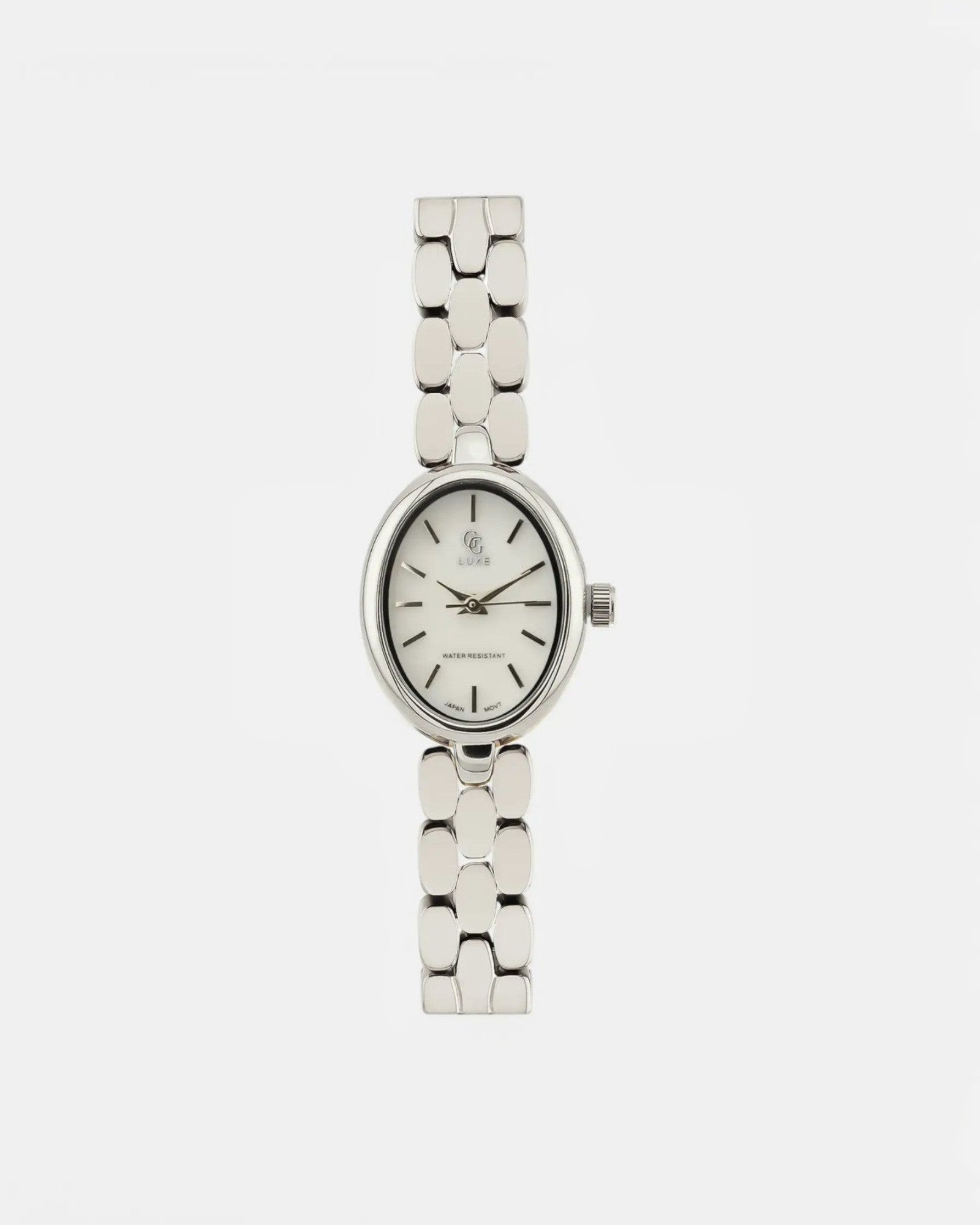 Montre Eve GG LUXE WATCH ovale argentée avec cadran blanc et bracelet à maillons polis.
