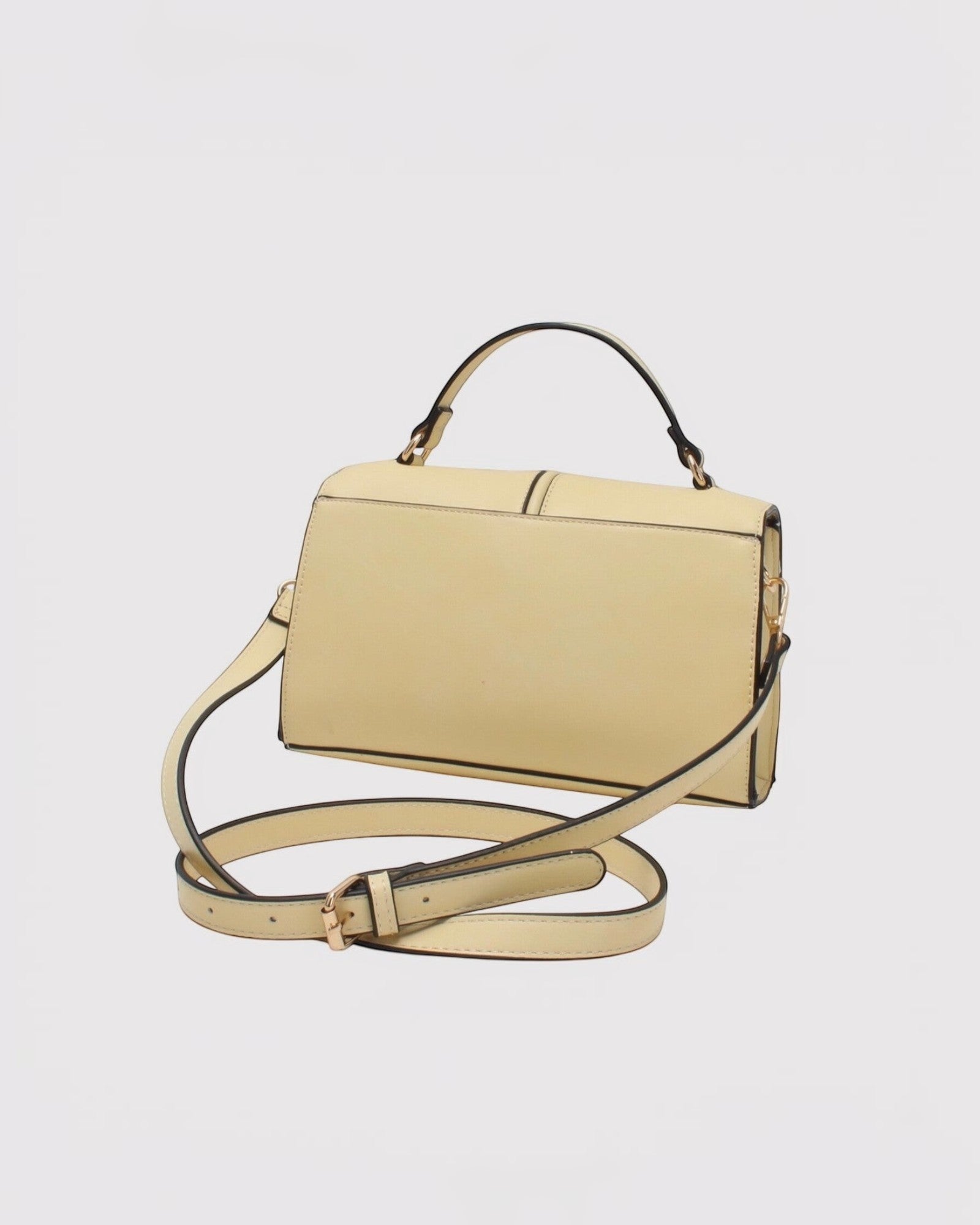 Sac bandoulière  BESTINI bi-matière jaune pâle avec fermoir à pression et anse.