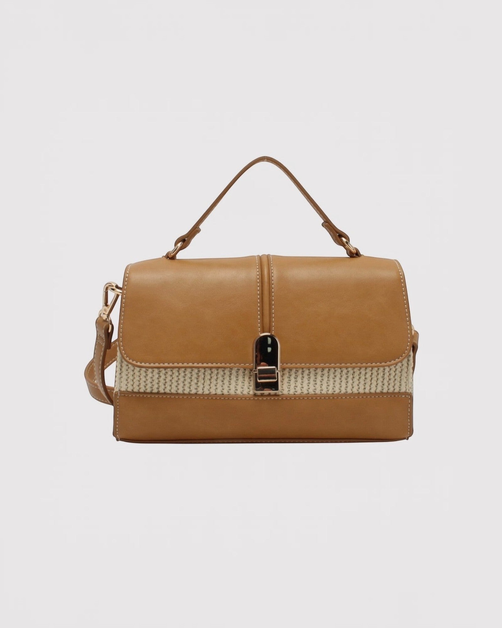 Sac bandoulière en cuir synthétique marron et tissu beige, avec fermoir à pression doré. Style bi-matière.