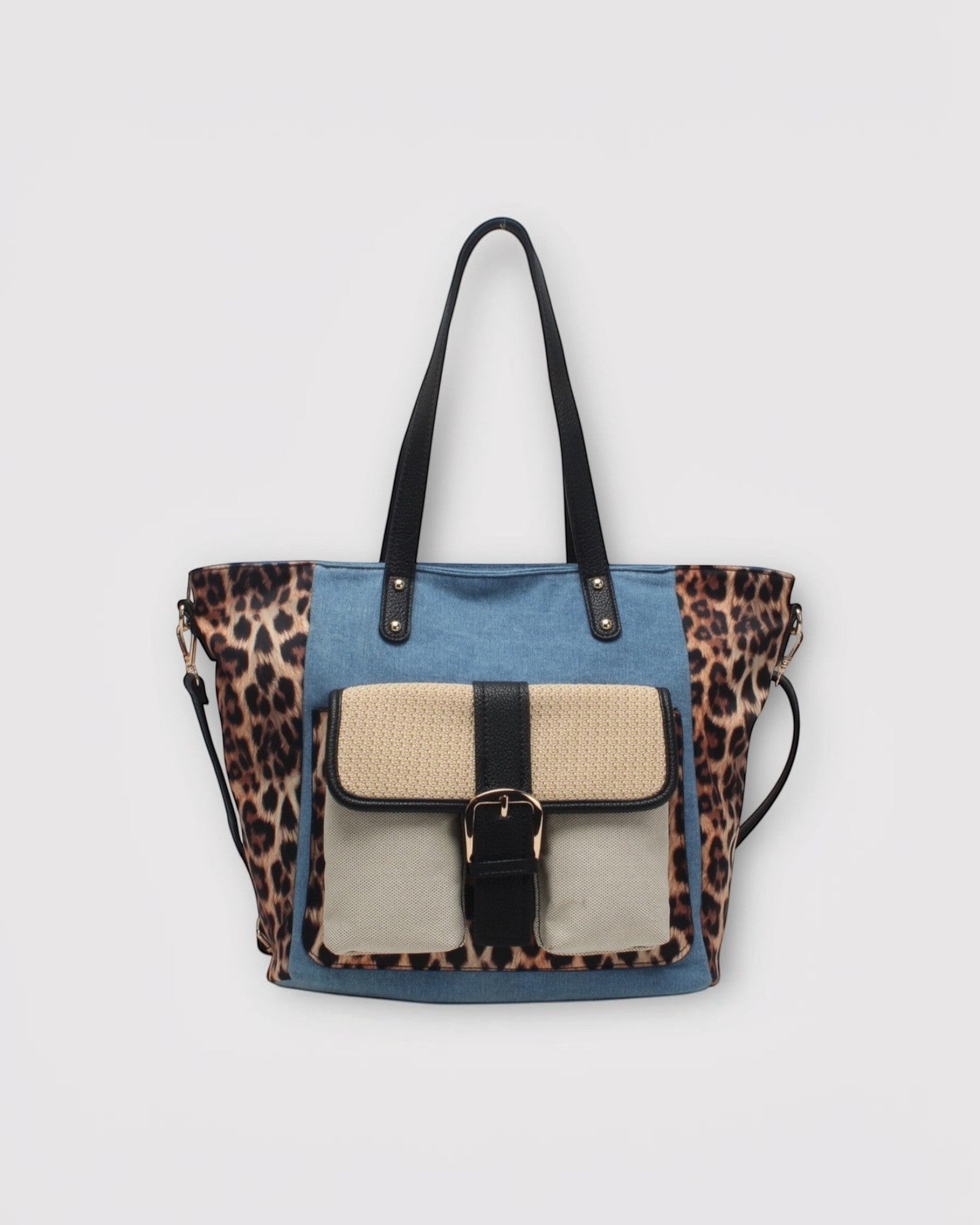 Sac cabas BESTINI effet léopard en jean avec anse et bandoulière amovible, poches avant à boucle.