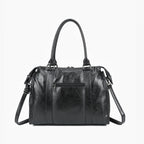 Sac de cours noir GALLANTRY en simili cuir brillant, format A4 avec bandoulière et poches zippées.