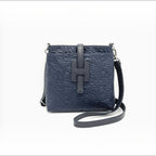 Sac d'épaule  SUIE VALENTINI en cuir bleu marine imprimé, fabriqué à la main en Italie avec bandoulière réglable.