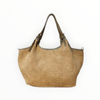 Sac à mainLOUISA LEE modèle Olga en raphia tressé naturel et anses en cuir de vachette, fabrication italienne.