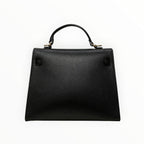 Sac Stella noir en cuir véritable italien avec poignée supérieure et détails dorés.