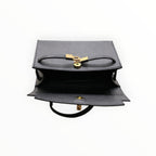 Sac Stella noir en cuir véritable italien LOUISA LEE avec fermoir doré et poignées structurées, idéal pour un look élégant.