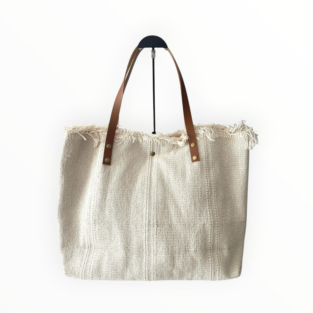 sac fourre-tout en toile crème avec imprimé citron, garniture en cuir et franges décoratives. Idéal pour l'été.