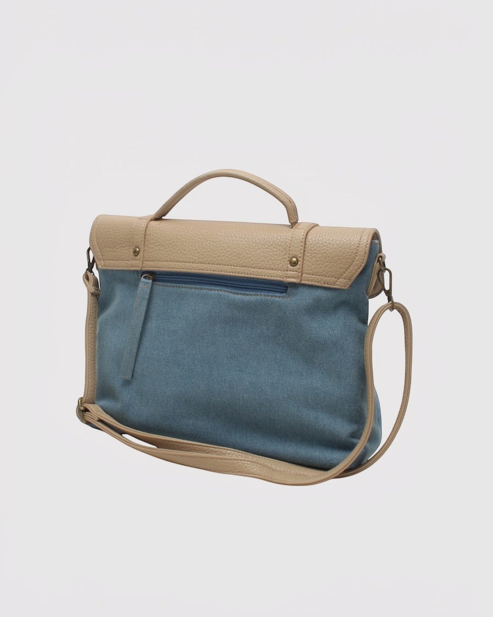 Sacoche bandoulière en toile denim bleu et similicuir beige, style cartable vintage avec poche zippée.